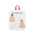 Twee ivoorkleurige haarclips met roze glitterkerstbomen en sterren op een Rockahula-kaartje.