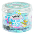 Crazy Aaron's Mermaid Magic wolkenslijm in een doorzichtige pot met zilverkleurig deksel op een witte achtergrond.