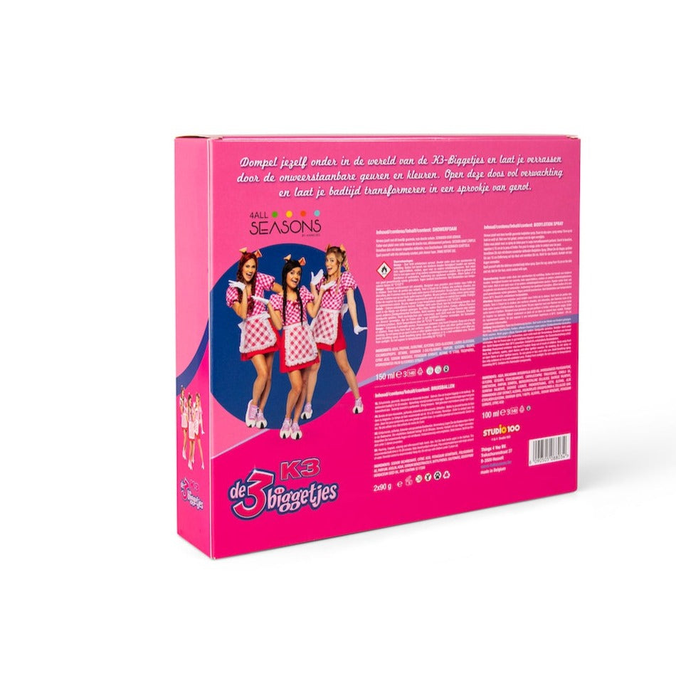 Achterkant van de roze K3 3 Biggetjes-geschenkdoos met de K3-zangeressen, productinformatie en barcode