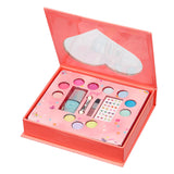 Geopende Souza make-upgeschenkset met gekleurde make-up, turquoise nagellak, applicators en vlinderstickers