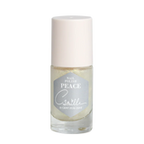 Camille Peace nagellak met lichtgouden glinstering in een doorzichtig flesje met witte dop.