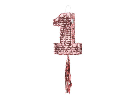 Roségouden piñata in de vorm van het cijfer 1 met ophanglus en lange slierten tegen een witte achtergrond.