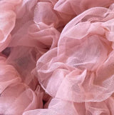 Detail van de roze Tutu Rok Loli met golvende laagjes tule.